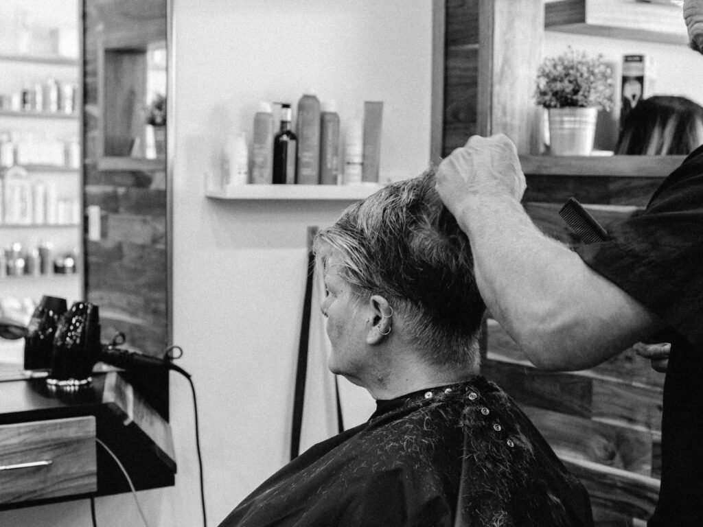 woman getting hair treatment