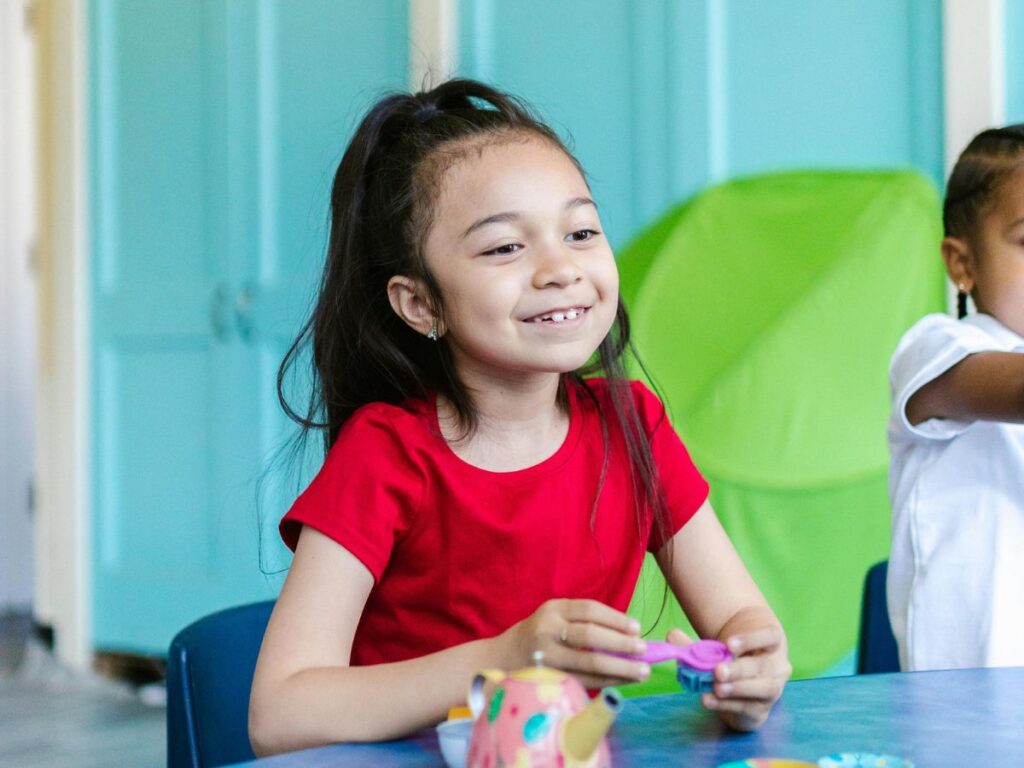 girl playing in school