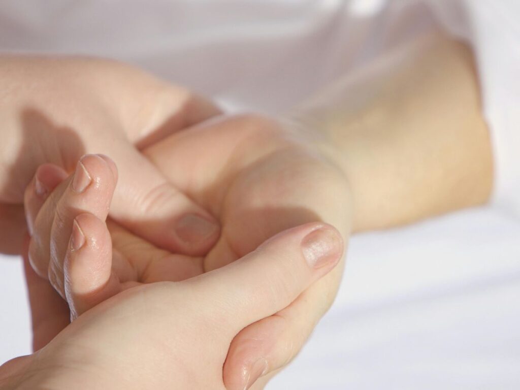 woman getting hand massage