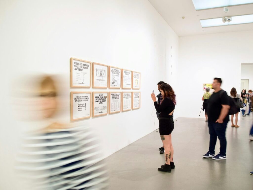 people looking at art in an art gallery