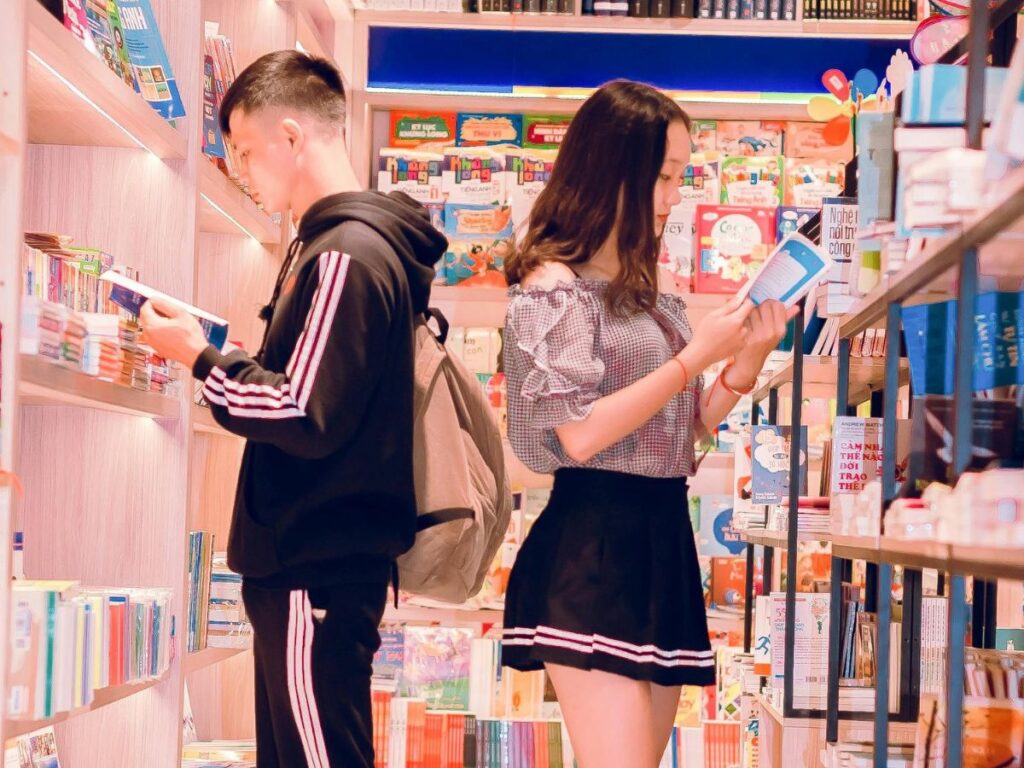 people reading books in a bookshop