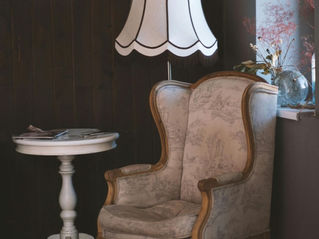 armchair with table and lamp