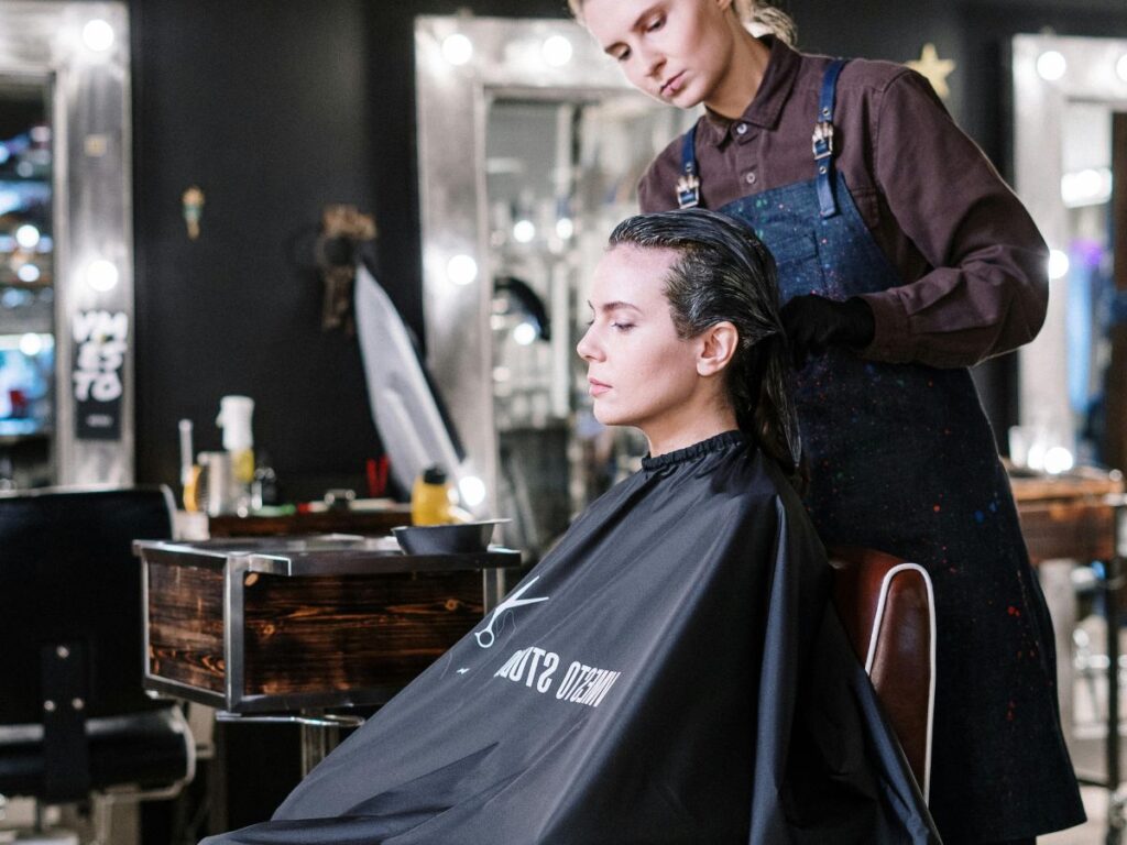 woman getting hair treatment