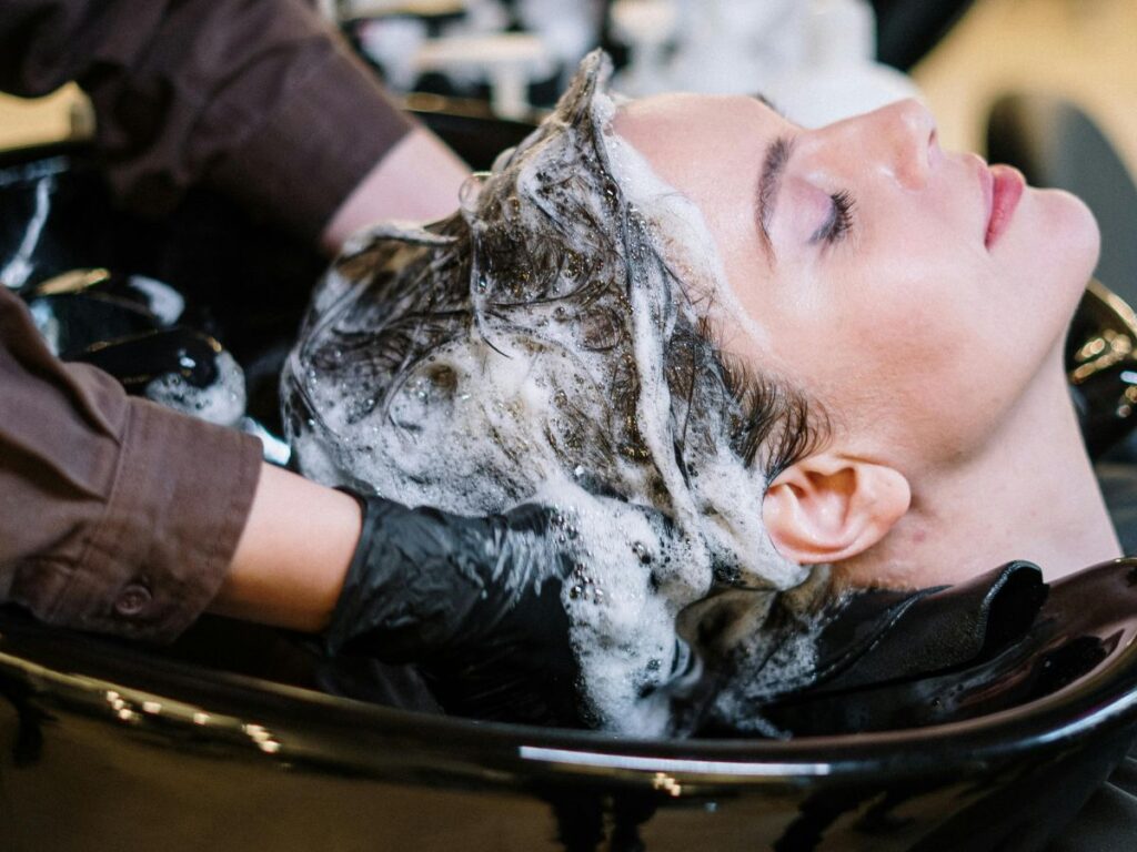 girl getting a hairwash