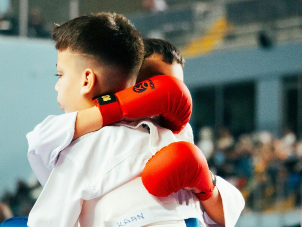 boxers hugging each other