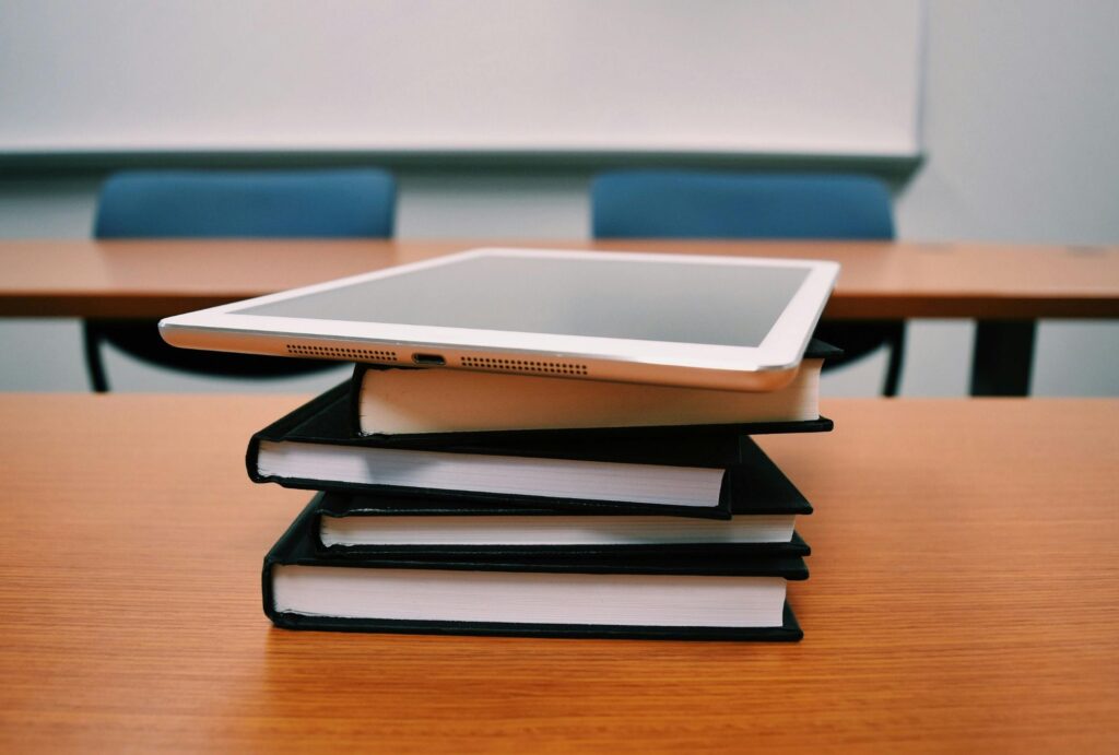 tablet and books on a university table