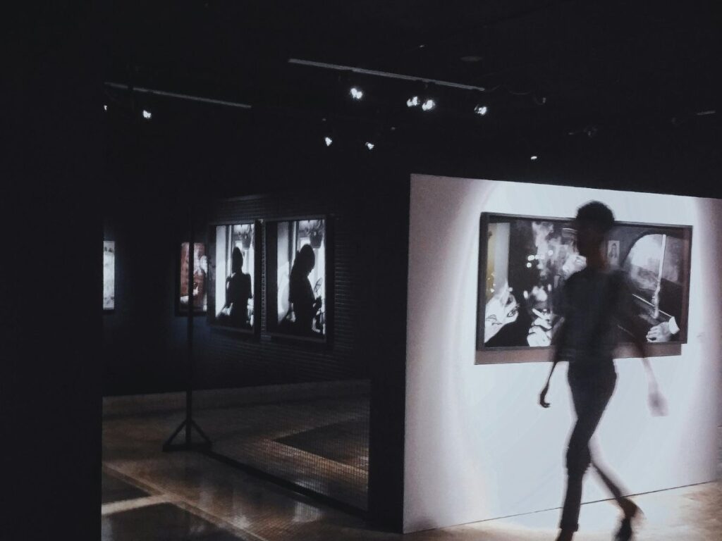 shadow of a woman in an art gallery