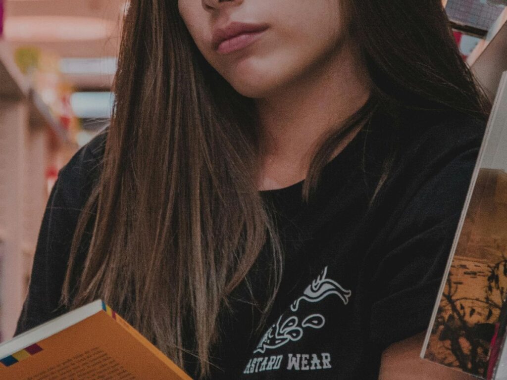 girl choosing book