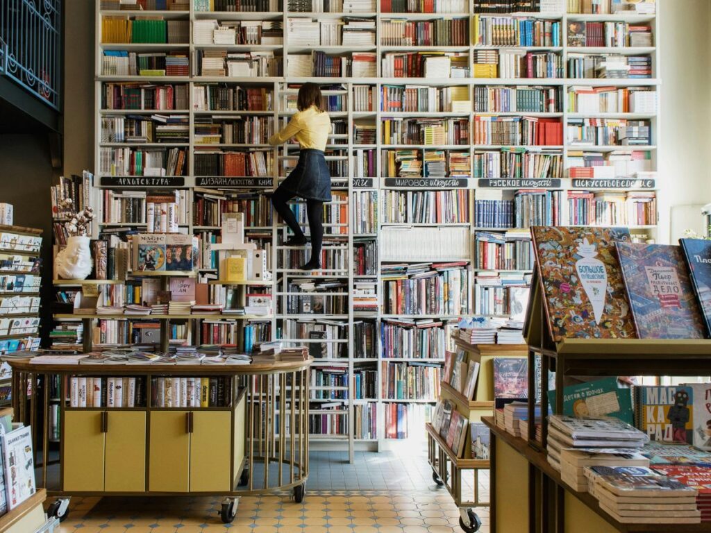 woman getting a book 