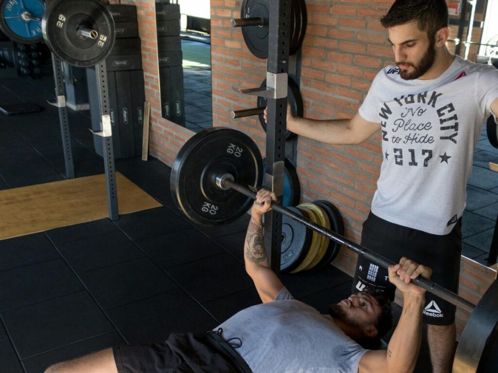 man working out and lifting weights