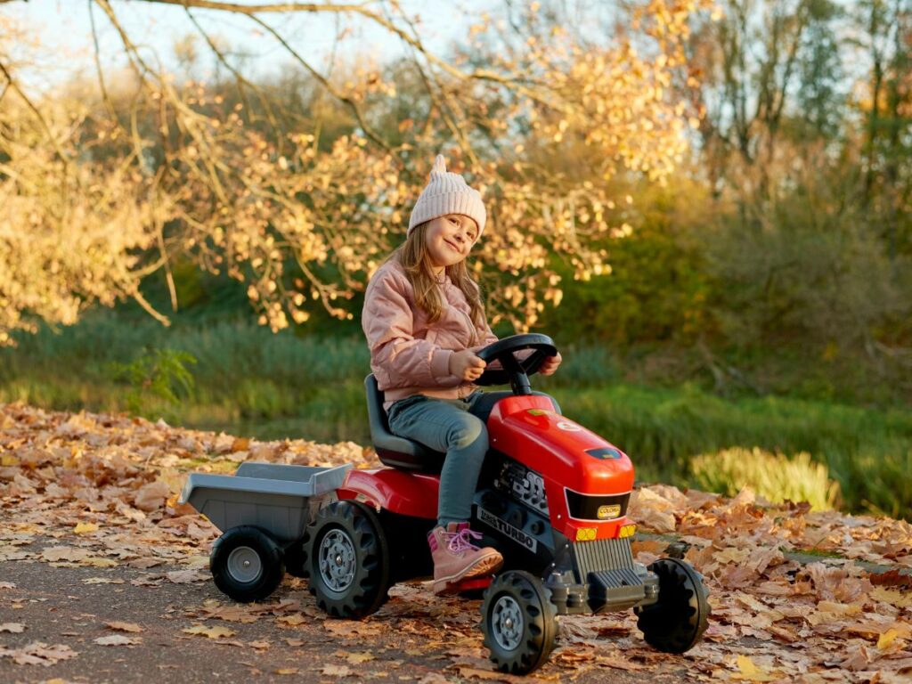 girl in a car in field