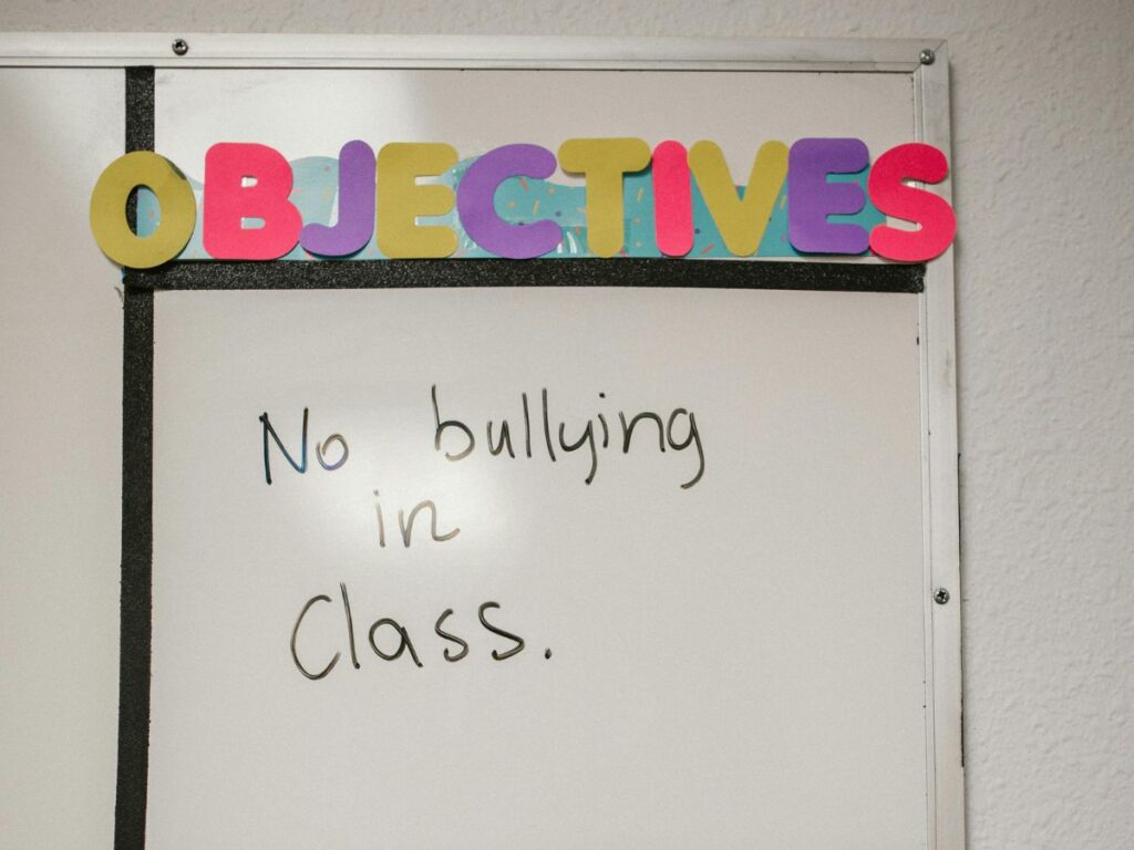 no bullying written on board in school