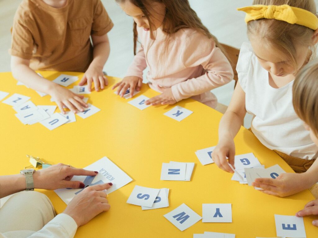 kids playing with flash cards