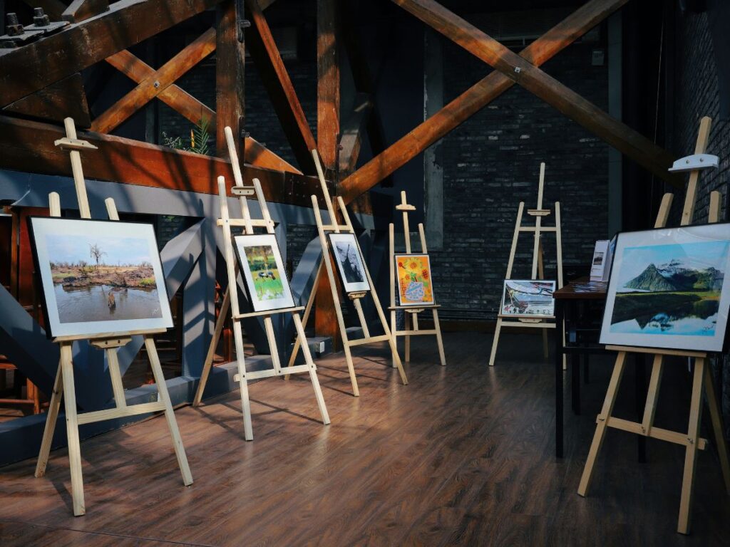 lots of paintings on canvases 