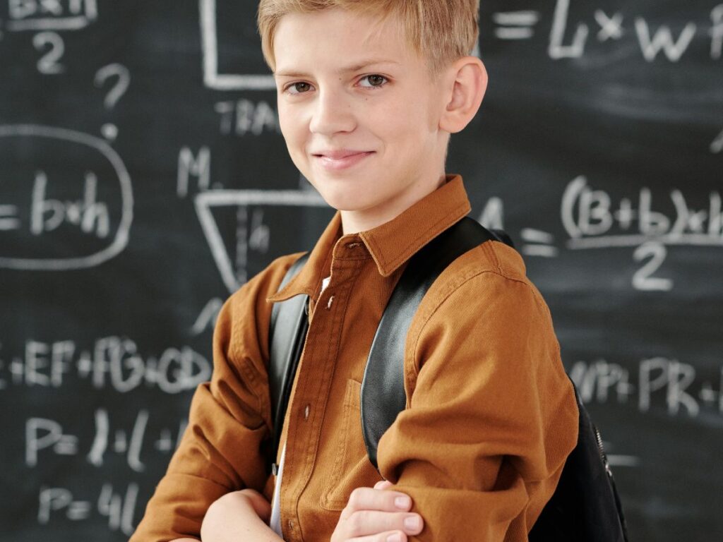 child wearing bag in school