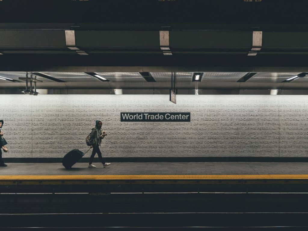 man walking in a transit station