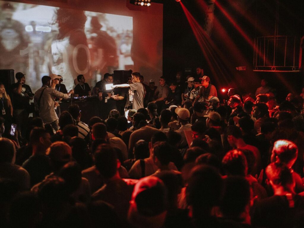 people enjoying concert in a concert hall