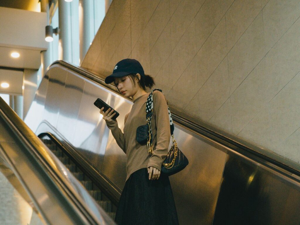 woman on an escalator