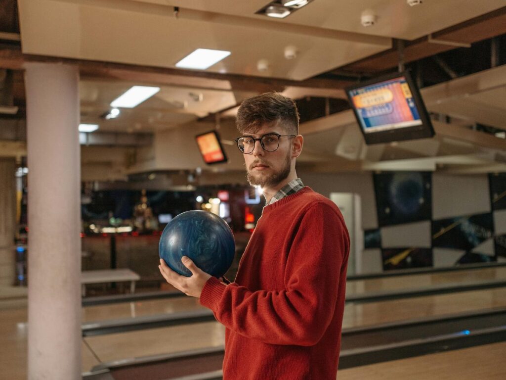 man ready for bowling in a bowling alley