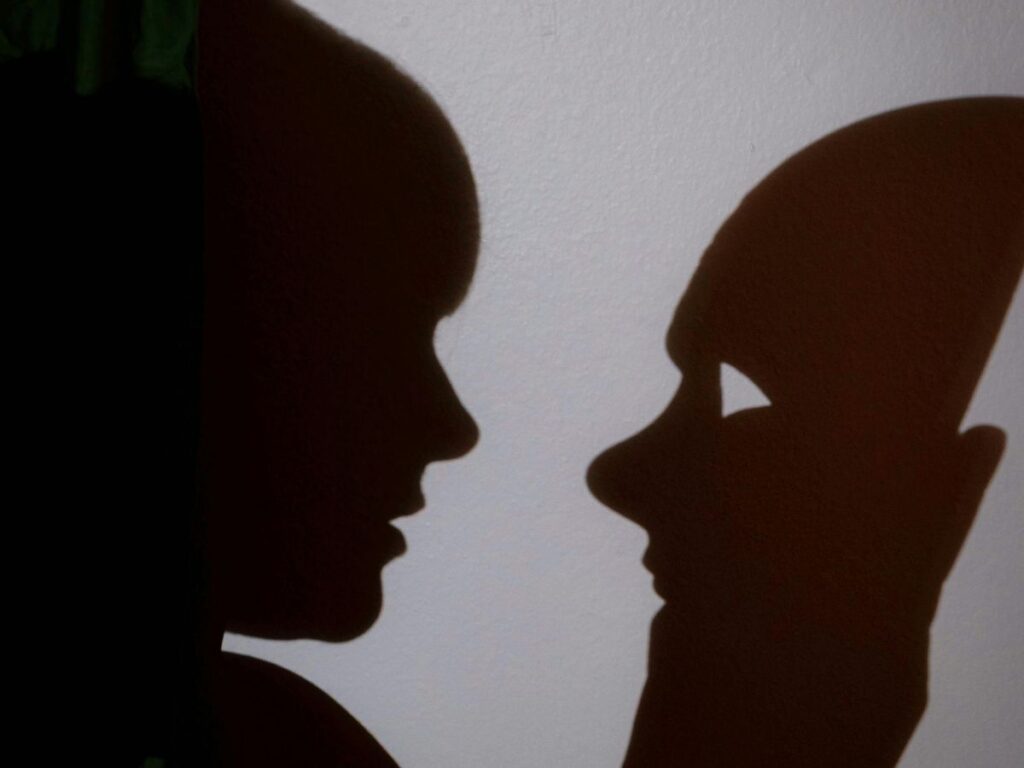 person holding mask