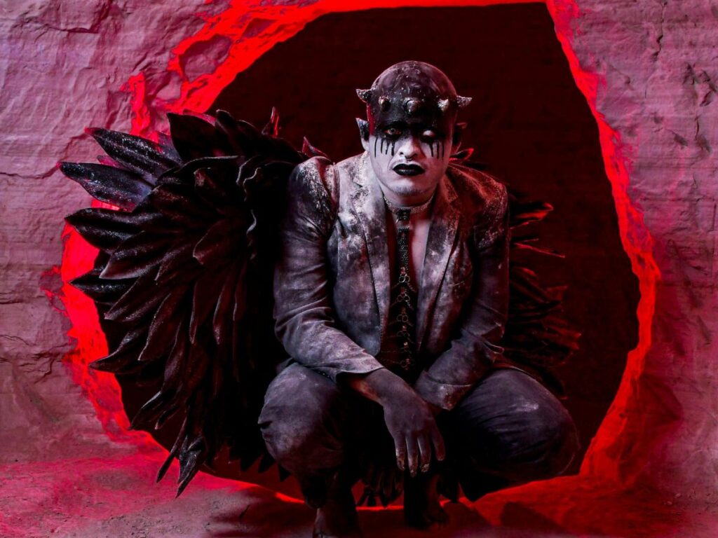 man dressed up for a theatre performance 